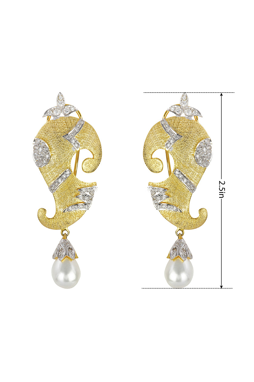 A closeup of abstract gold and cubic zirconia earrings from BenzerWorld ethnicwear store.