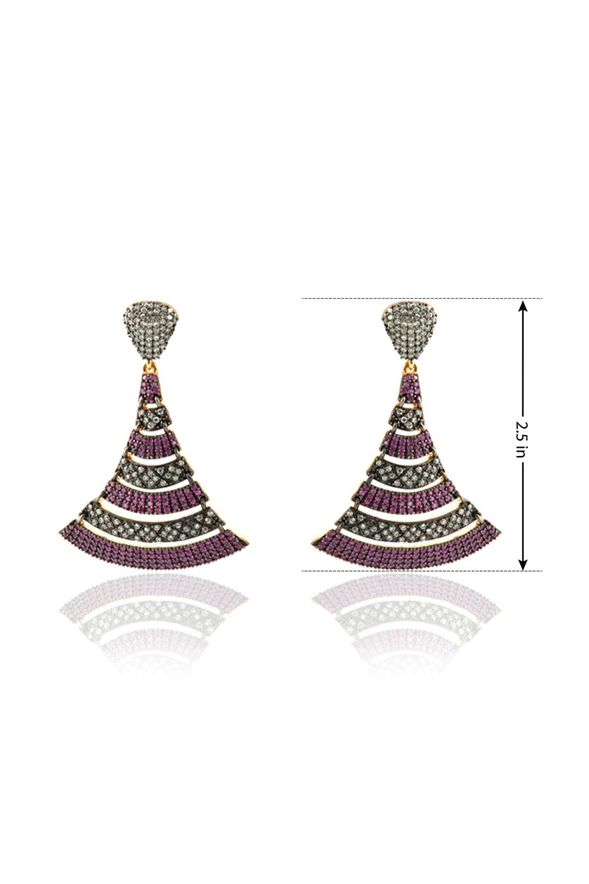 A closeup of American diamond earrings with ruby stone in gold plating from BenzerWorld ethnicwear store.
