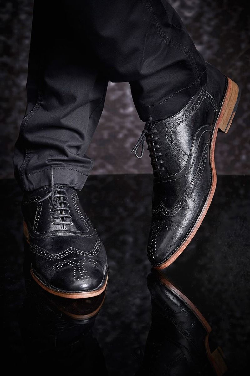 Black pure leather pattern shoes from BenzerWorld ethnicwear store.