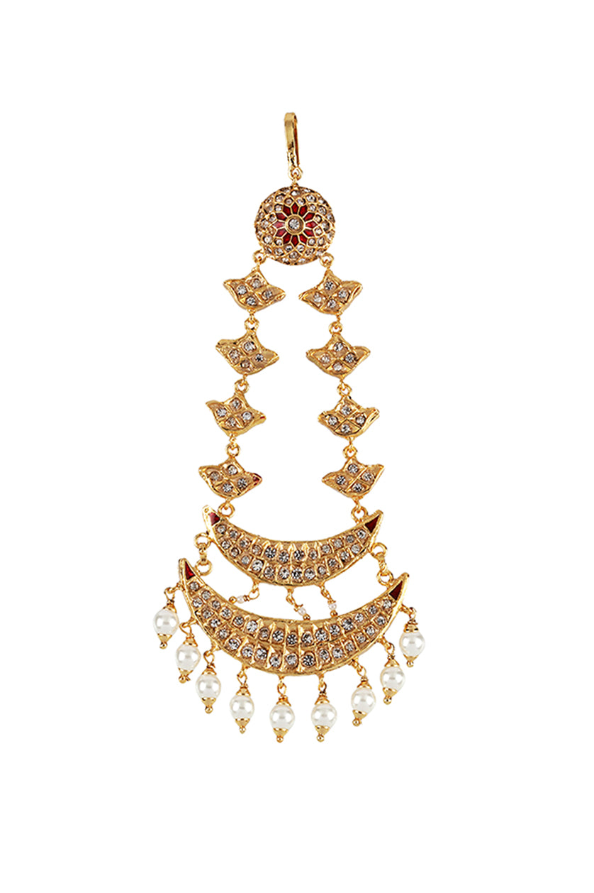 A closeup of a crescent-shaped hair accessory from BenzerWorld ethnicwear store.