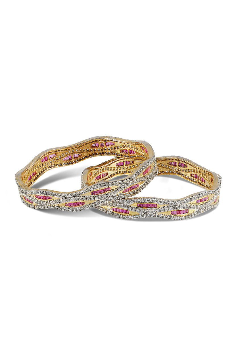 A closeup of diamond bangles with wave patterns from BenzerWorld ethnicwear store.