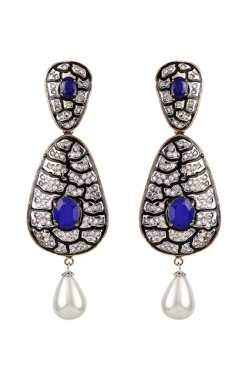 A closeup of earrings in black meenakari work from BenzerWorld ethnicwear store.