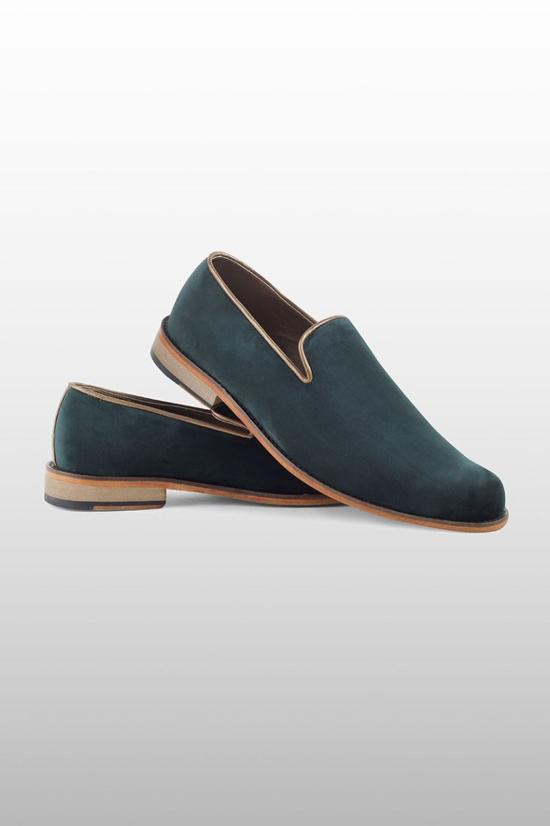 Green velvet shoes from BenzerWorld ethnicwear store.
