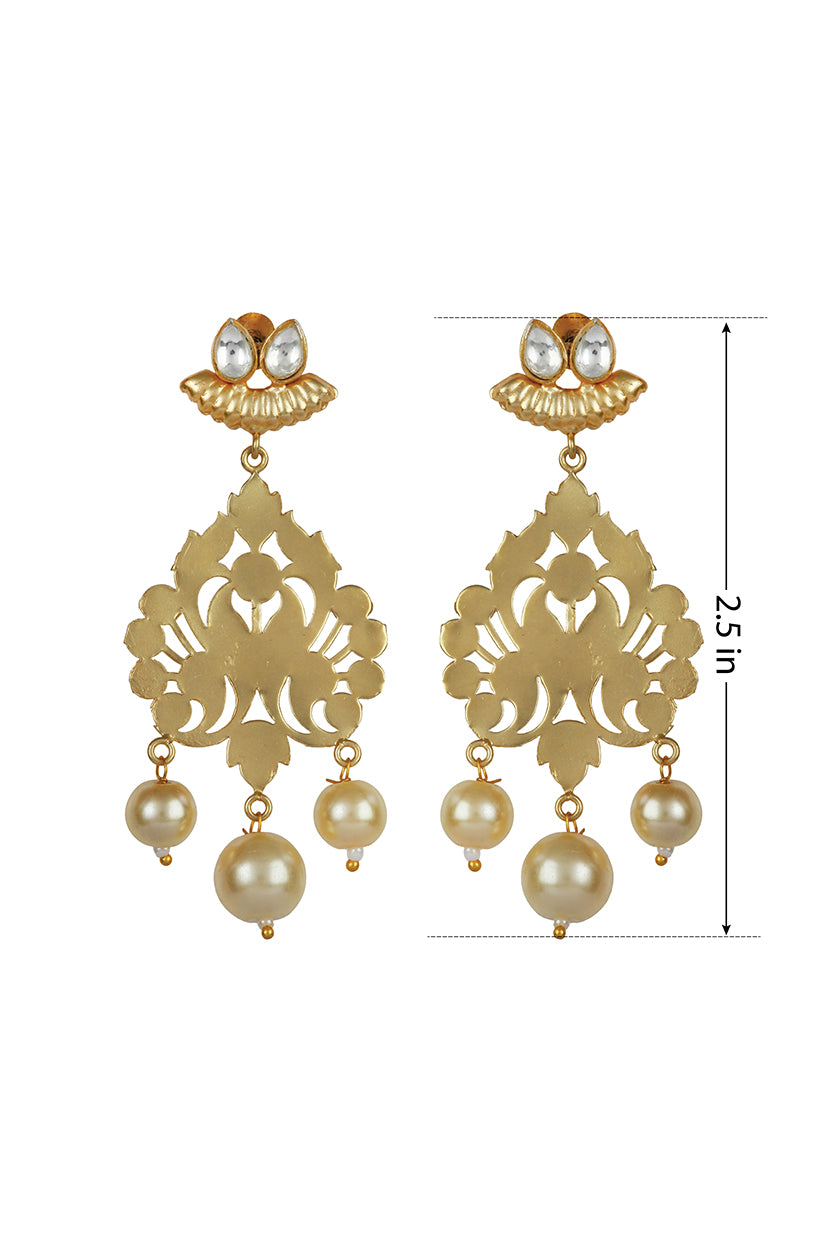 A closeup of laser-cut kundan earrings from BenzerWorld ethnicwear store.