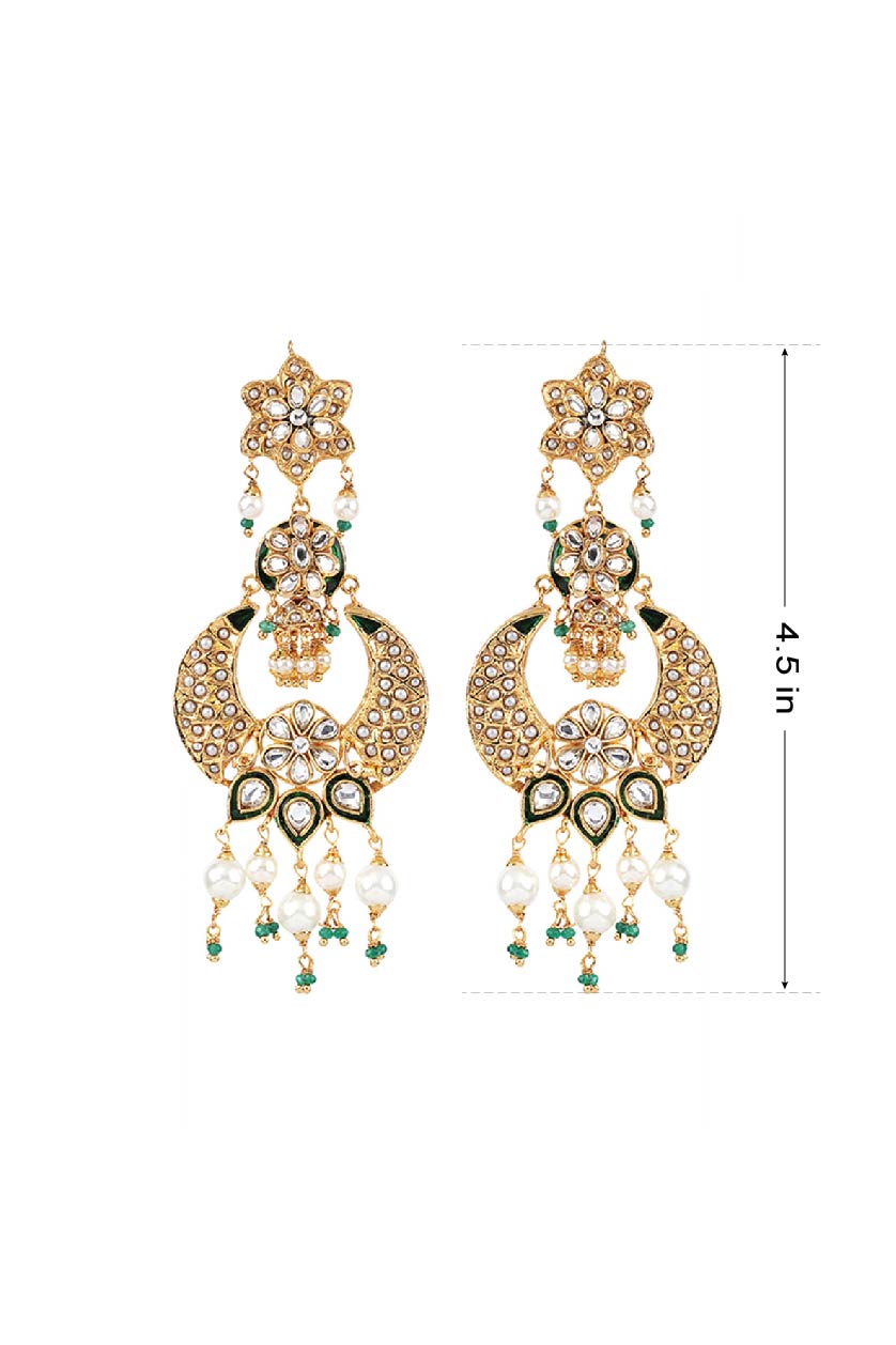 A closeup of long earrings in semi cultural pearls from BenzerWorld ethnicwear store.