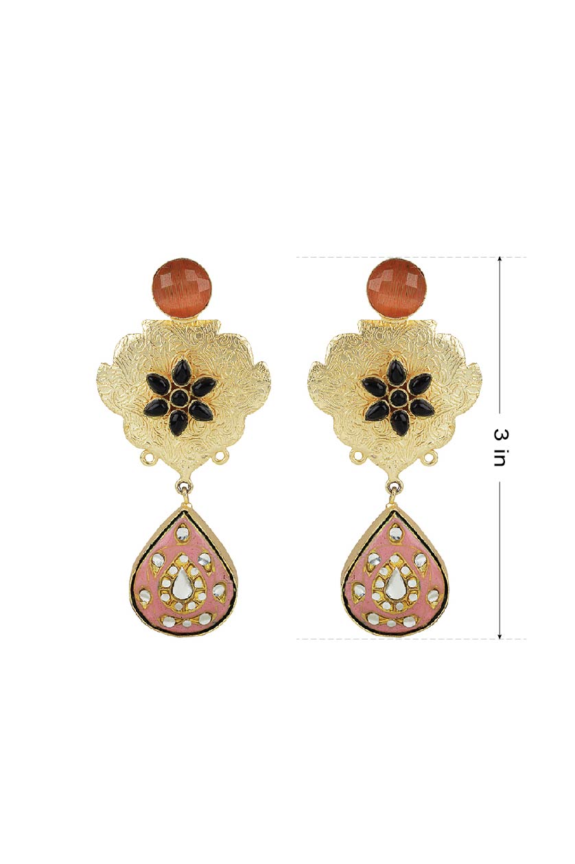 A closeup of long earrings with black stone and topaz from BenzerWorld ethnicwear store.