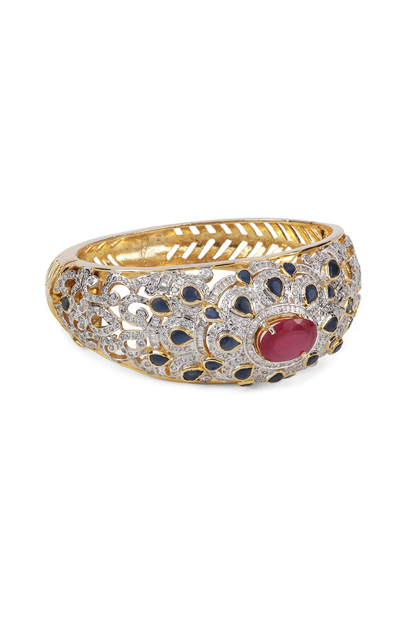 A closeup of red bracelets in cubic zirconia from BenzerWorld ethnicwear store.