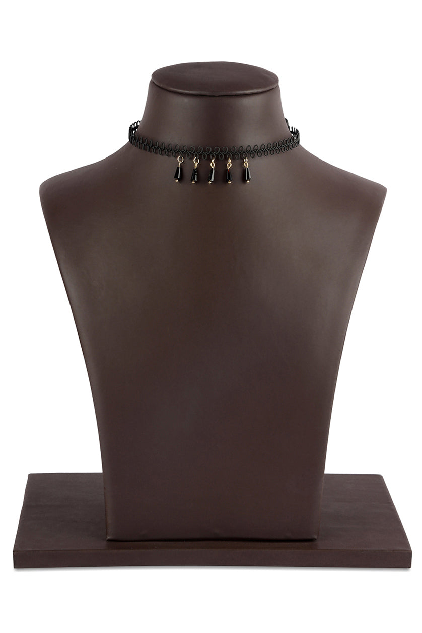 A closeup of stiff choker with black drops from BenzerWorld ethnicwear store.