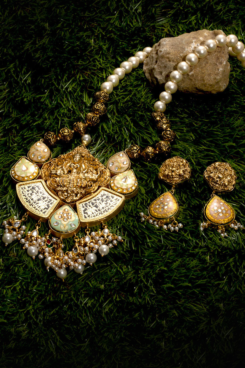 A closeup of temple design set from BenzerWorld ethnicwear store.