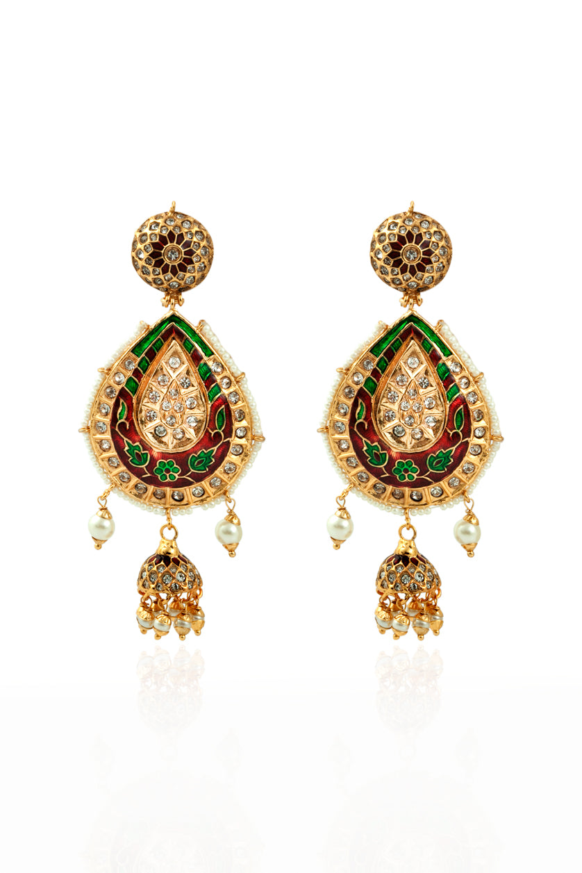 A closeup of jadau earrings with meenakari in gold plating from BenzerWorld ethnicwear store.